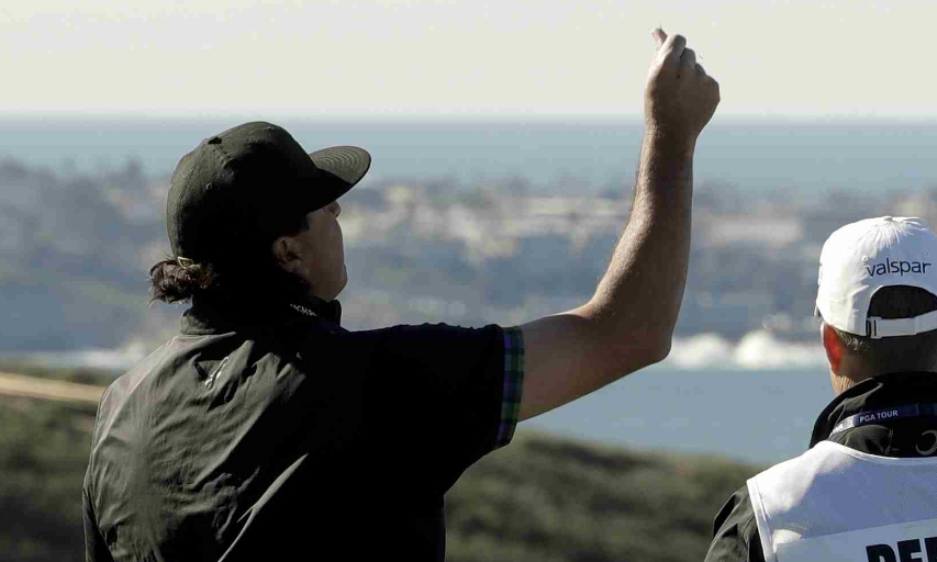 Pat Perez Checks The Wind On The Third Hole During The Second Round Of The Farmers Insurance Open