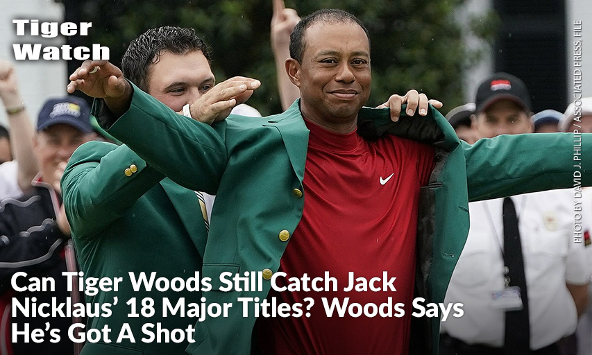 Patrick Reed Helps Tiger Woods With His Green Jacket After Woods Won The 2019 Masters.