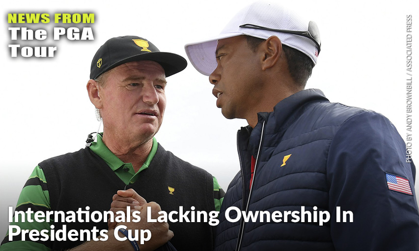 International Team Captain Ernie Els Shakes Hands With U.S. Team Player And Captain Tiger Woods After The U.S. Team Won The Presidents Cup, 16-14.