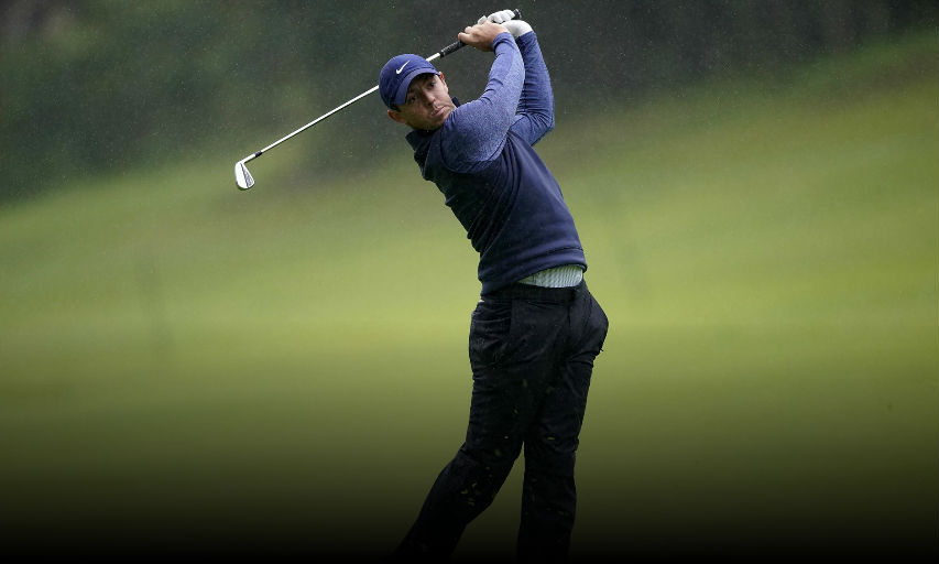 FILE - In this Friday, Feb. 15, 2019 file photo, Rory McIlroy, of Northern Ireland, hits his second shot in the rain on the 18th hole during the second round of the Genesis Open golf tournament at Riviera Country Club in Los Angeles. McIlroy begins his road to the Masters this week at the Arnold Palmer Invitational at Bay Hill. (AP Photo/Ryan Kang, File)