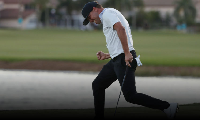 Keith Mitchell celebrates as he sinks his putt on the 18th hole to win the final round of the Honda Classic golf tournament, Sunday, March 3, 2019, in Palm Beach Gardens, Fla. (AP Photo/Wilfredo Lee)