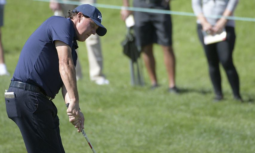 Phil Mickelson chips onto the second green during the second round of the Arnold Palmer Invitational. (AP Photo/Phelan M. Ebenhack) Phil Mickelson