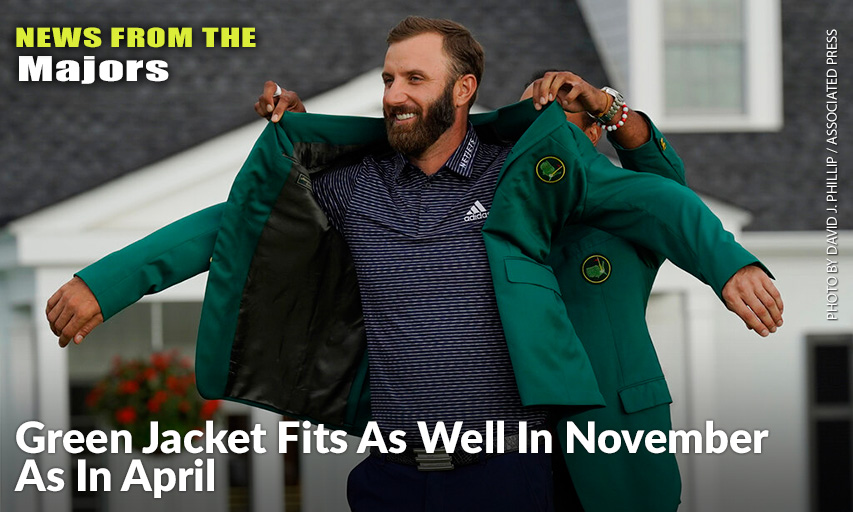 Tiger Woods Helps Masters Champion Dustin Johnson With His Green Jacket After His Victory At The 2020 Masters.
