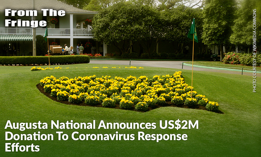 The Logo For The Masters Tournament Made Of Flowers, In Front Of The Clubhouse Of The Augusta National Golf Club.
