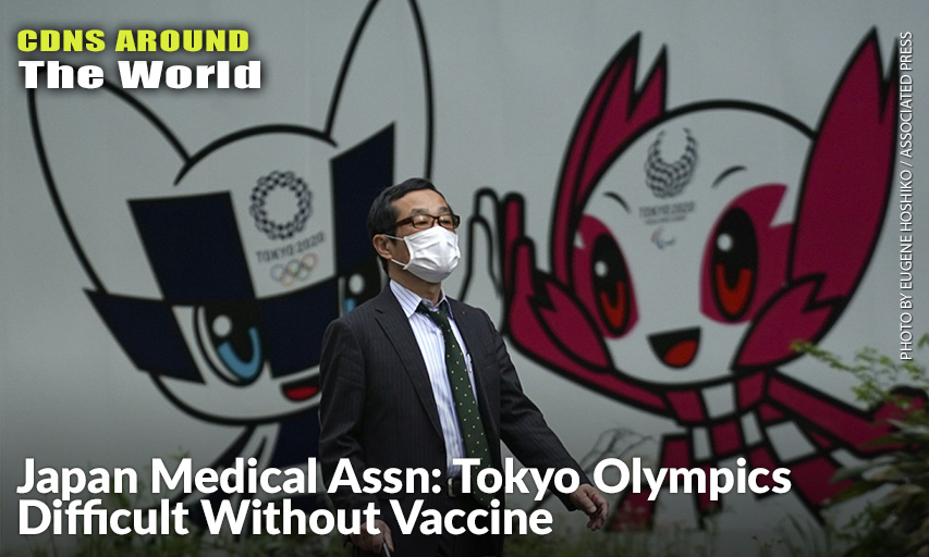 A Man With A Face Mask Against The Spread Of The New Coronavirus Walks In Front Of Miraitowa And Someity, Mascots For The Tokyo 2020 Olympics And Paralympics At A Park In Tokyo. Japan's Prime Minister Shinzo Abe Expanded A State Of Emergency To All Of Japan From Just Tokyo And Other Urban Areas As The Virus Continues To Spread.