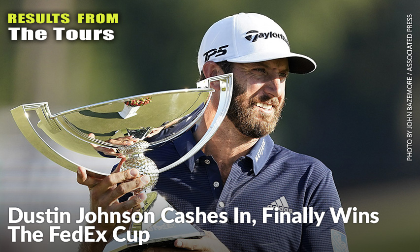 Dustin Johnson Holds Up The FedEx Cup Trophy After Winning The TOUR Championship. Dustin Johnson