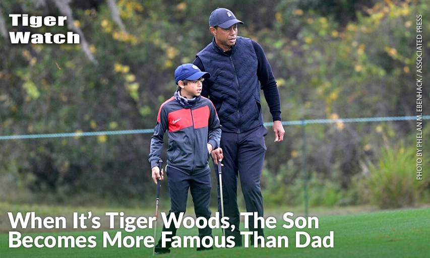Tiger Woods Lines Up A Shot With His Son Charlie On The 12th Green During A Practice Round Of The PNC Championship.