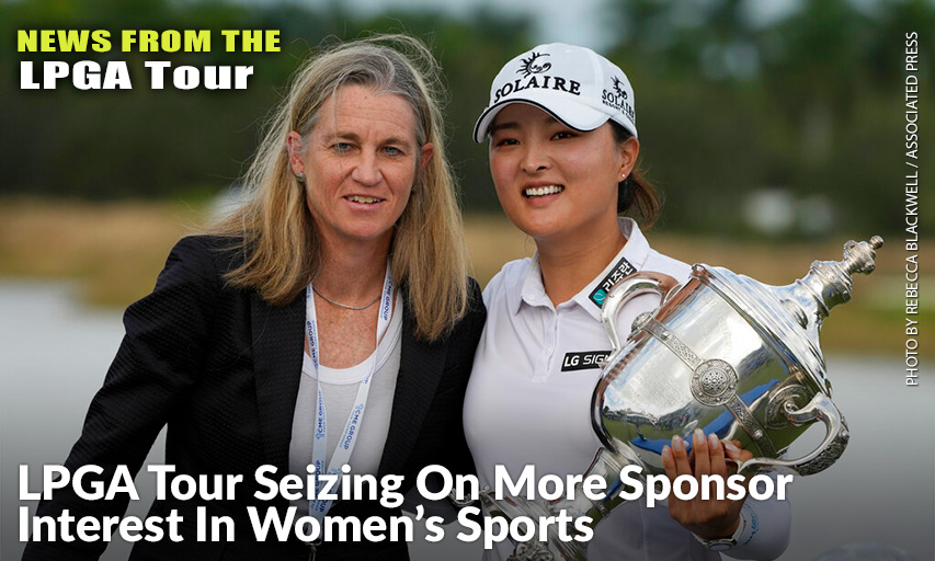 Jin Young Ko Holds The Player Of The Year Trophy Along With LPGA Commissioner Mollie Marcoux After Winning The LPGA Tour Championship. LPGA Commissioner Mollie Marcoux and Jin Young Ko