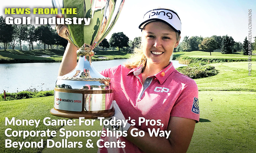 Brooke Henderson Holding The 2018 CP Canadian Women’s Open Championship Trophy.
