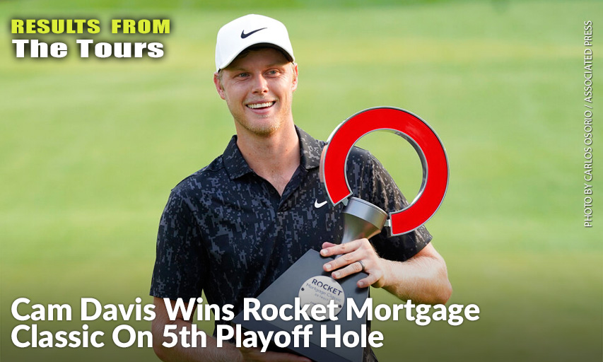 Cam Davis Holds The Winner's Trophy After The Final Round Of The Rocket Mortgage Classic. Cam Davis