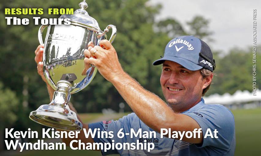 Kevin Kisner Hoists The Trophy After He Sunk A Birdie Putt On The Second Playoff Hole To Win The Wyndham Championship. Kevin Kisner